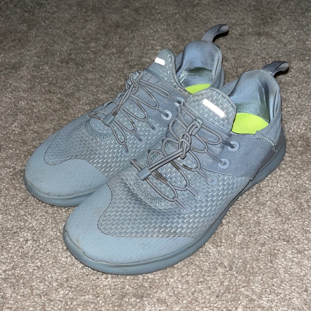 Worn Nike running shoes gray size 9